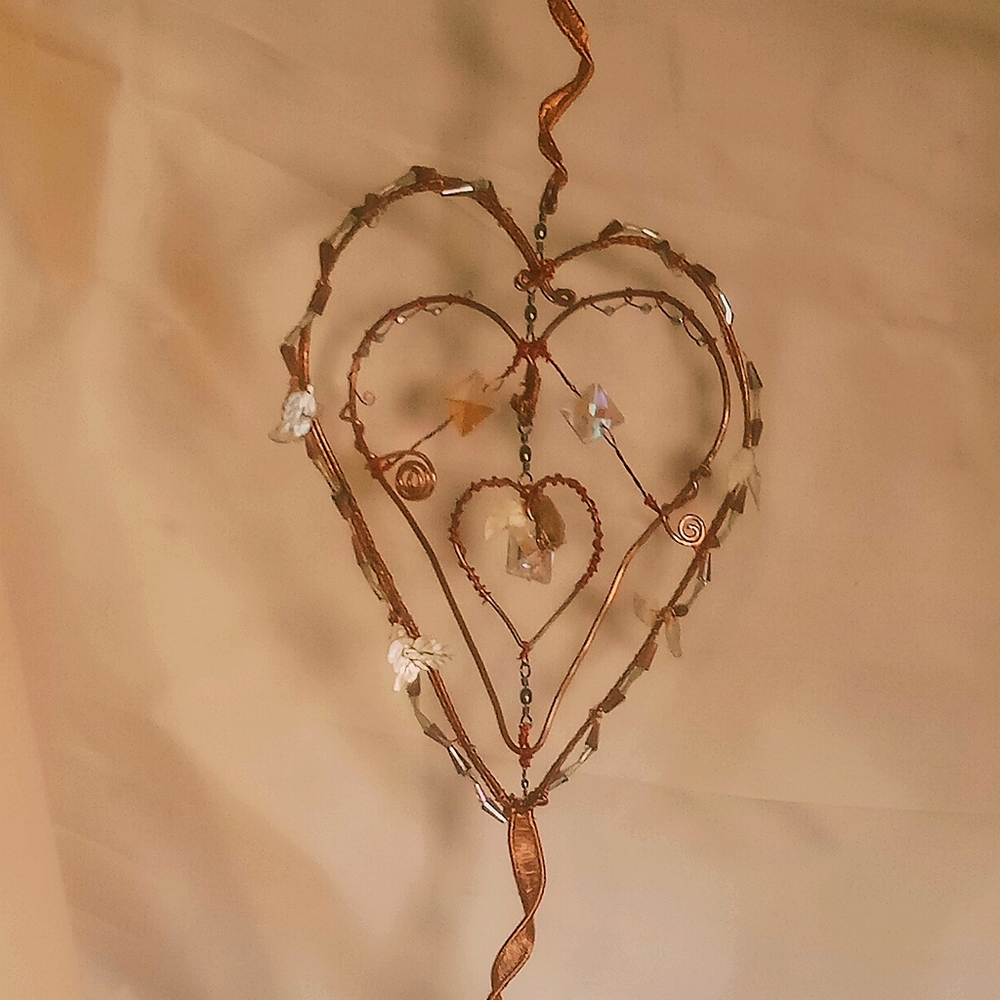 Hand Crafted Copper Spinning Hearts - Picture 3 of 3